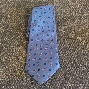 Thai silk men's tie blue with elephants 100% silk